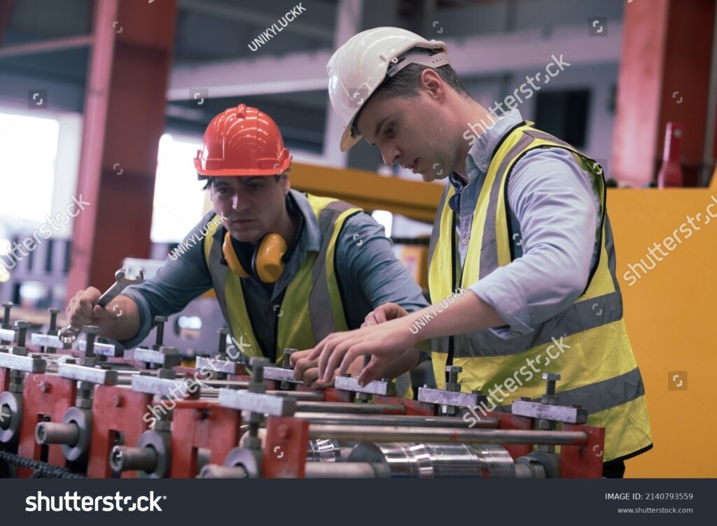 Metal stamping manufacturer factory floor with production presses and equipment