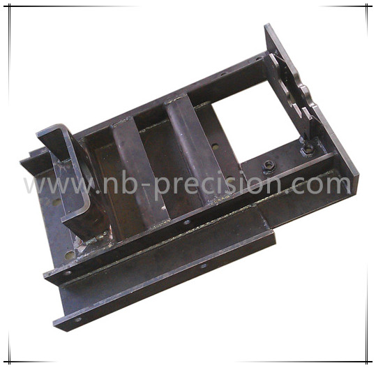 Metal stamping sub-assembly with welding and riveting