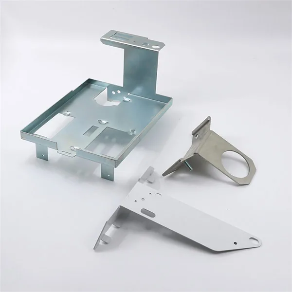 Variety of stamped metal components — brackets, EMI shields, clips, and structural parts